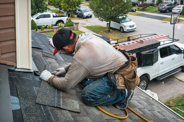 Professional Roofing technician working in Webster City, IA
